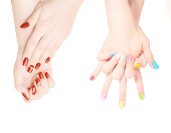 Woman hands with colored nail polish set in the row. Isolated on white